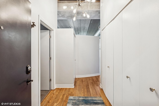 hall with light wood-type flooring