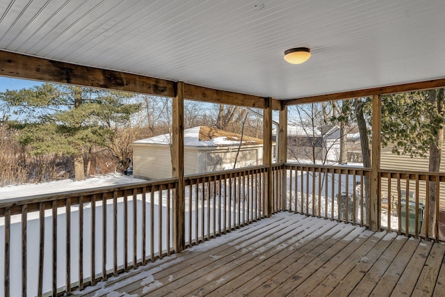 view of snow covered deck