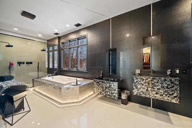 bathroom with tile walls, plus walk in shower, and tile patterned floors