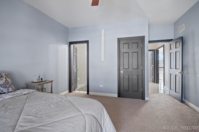 carpeted bedroom featuring ceiling fan and connected bathroom