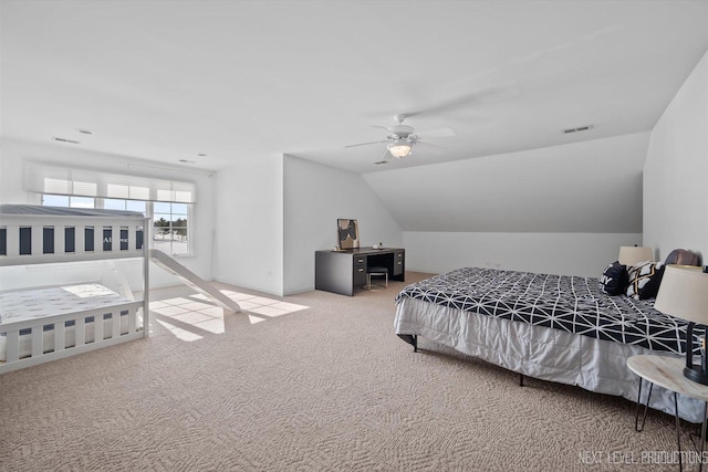 bedroom featuring lofted ceiling, ceiling fan, and carpet