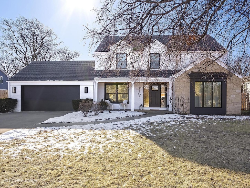 view of front of property with a garage