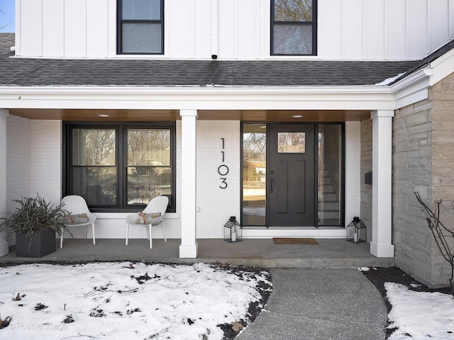 property entrance with covered porch