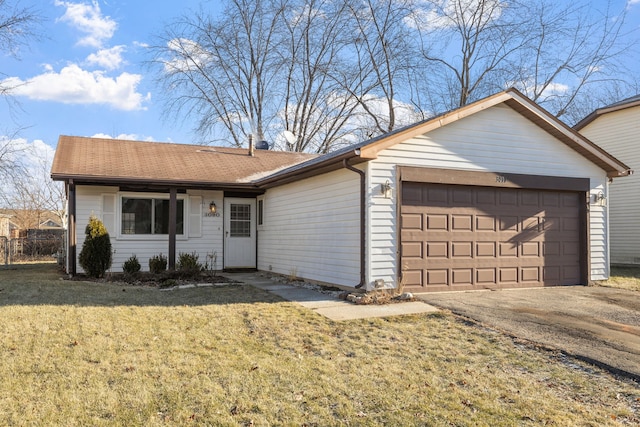 single story home featuring a garage and a front yard