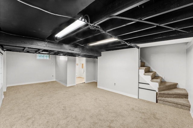 basement with carpet flooring