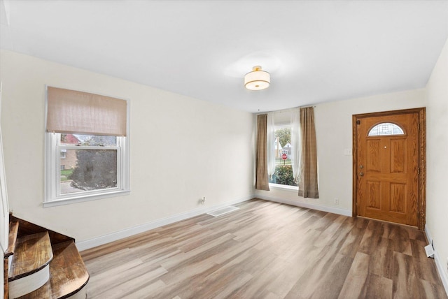 entrance foyer featuring light wood-type flooring