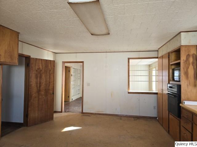 kitchen featuring black oven