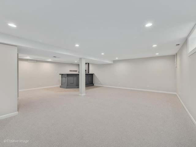 basement with light carpet