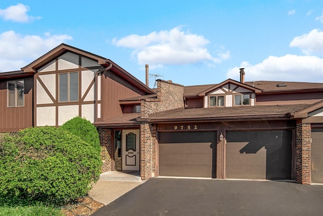 tudor home with a garage