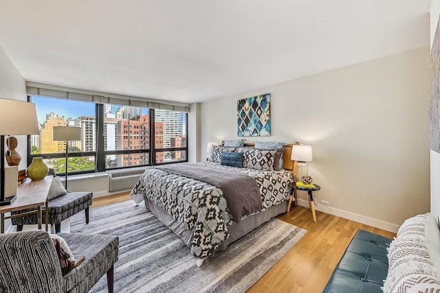 bedroom featuring hardwood / wood-style floors