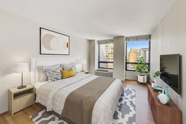 bedroom featuring light wood-type flooring