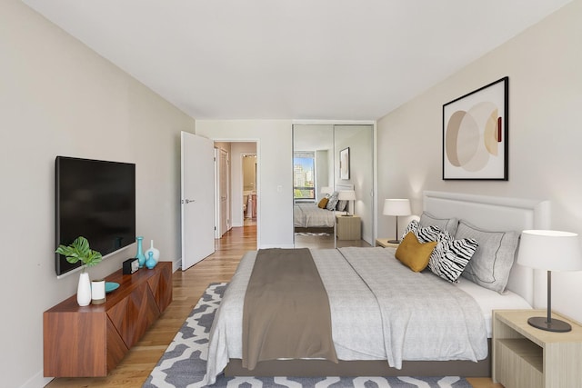 bedroom with light hardwood / wood-style flooring