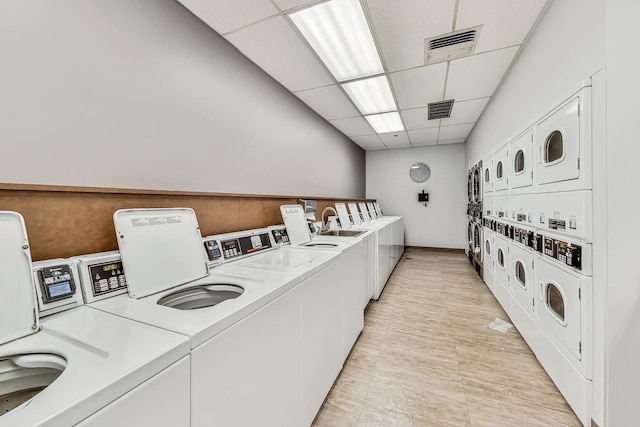 washroom featuring washer and dryer and stacked washer and clothes dryer