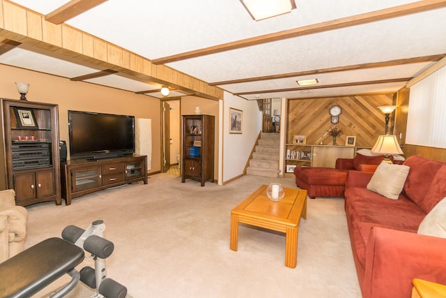 living room featuring light colored carpet, beam ceiling, and wooden walls