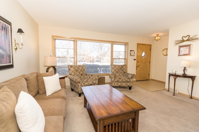 carpeted living room featuring a wealth of natural light