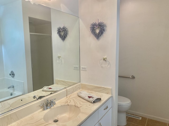 full bathroom featuring toilet, vanity, tile patterned flooring, and shower with separate bathtub