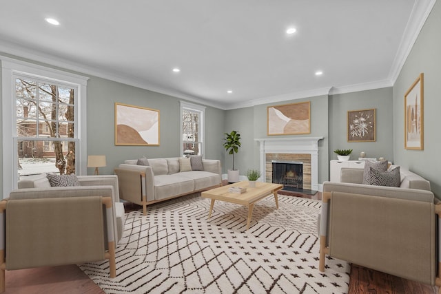 living room featuring ornamental molding and hardwood / wood-style flooring