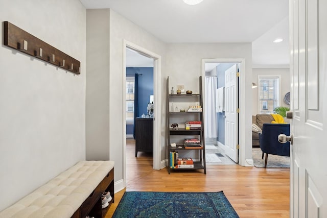 hallway featuring light hardwood / wood-style floors