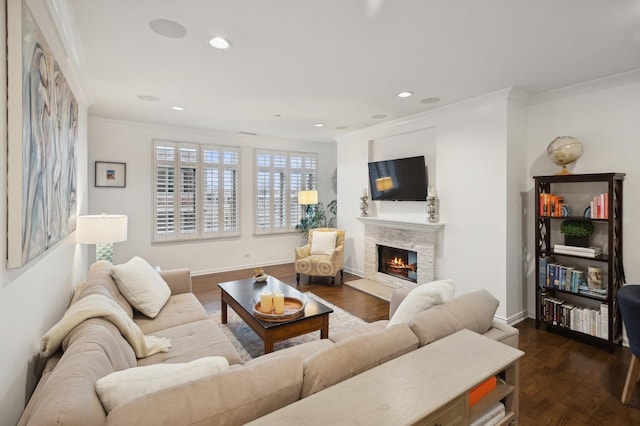 living room with dark wood-type flooring and ornamental molding