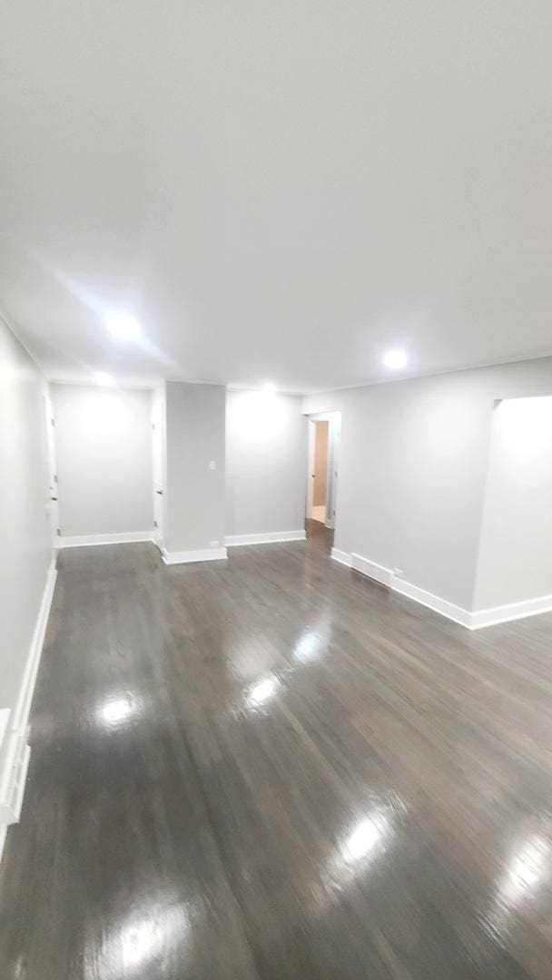 basement with dark wood-type flooring