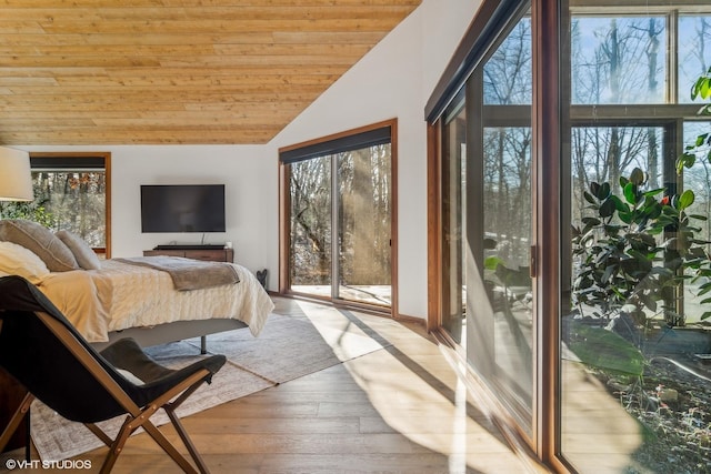 bedroom with access to exterior, vaulted ceiling, wooden ceiling, and light hardwood / wood-style floors