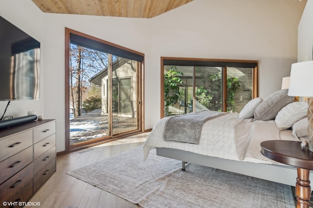 bedroom with wood ceiling, lofted ceiling, light wood-type flooring, and access to outside