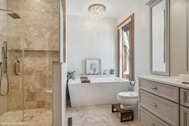 full bathroom with vanity, independent shower and bath, toilet, and an inviting chandelier