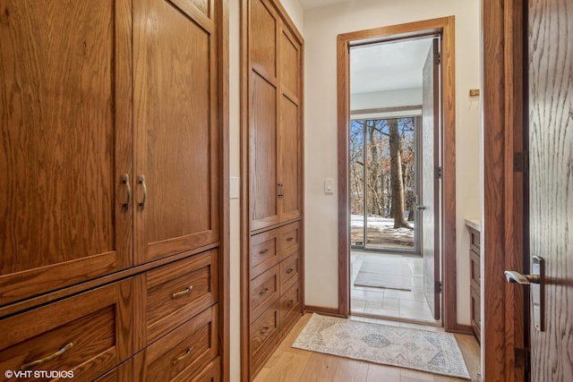 doorway with light hardwood / wood-style floors