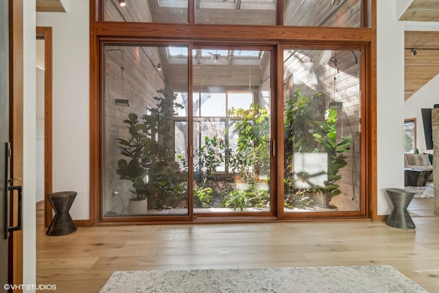 doorway to outside with hardwood / wood-style flooring