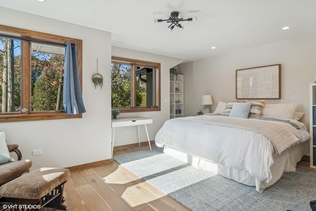 bedroom with light wood-type flooring