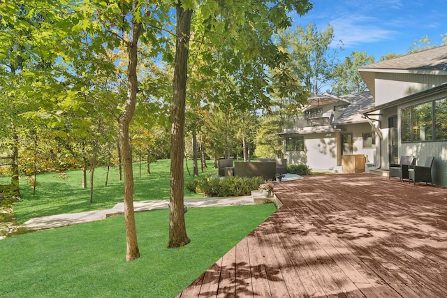 view of yard featuring an outdoor living space and a deck