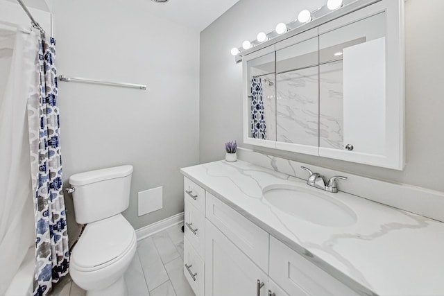 bathroom with toilet, vanity, and a shower with curtain