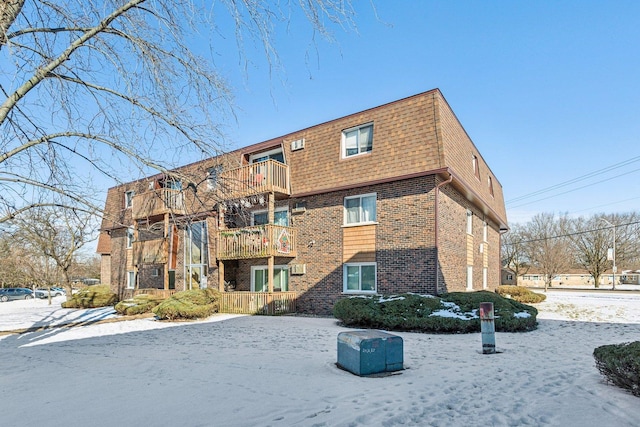 view of snow covered property