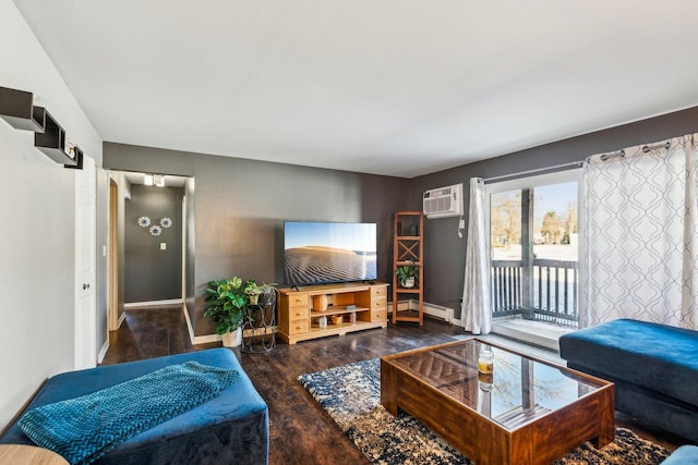 living room with baseboard heating, dark hardwood / wood-style flooring, and a wall unit AC