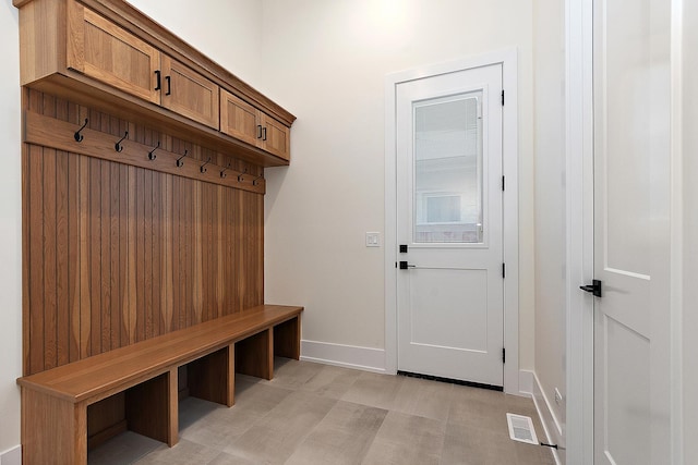 mudroom with visible vents and baseboards