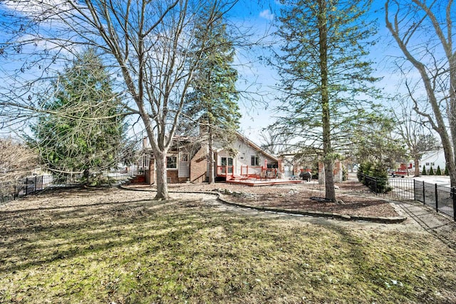 view of yard with a wooden deck