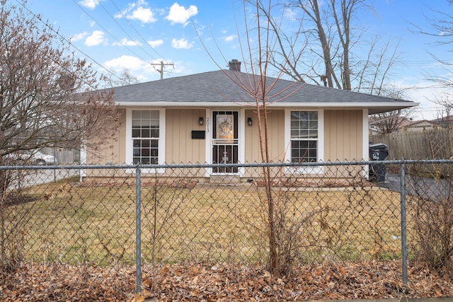 ranch-style house with a front lawn