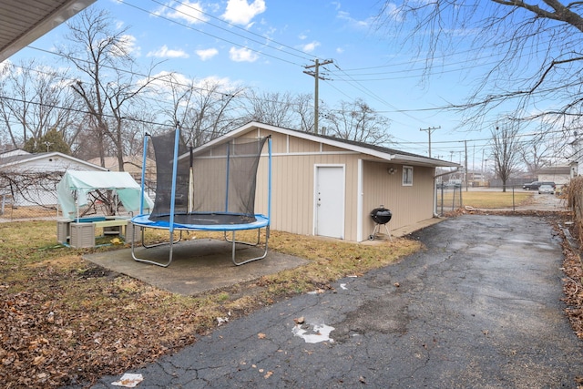 view of outbuilding featuring a trampoline