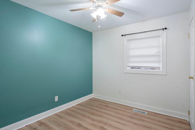 unfurnished room featuring ceiling fan and light hardwood / wood-style floors