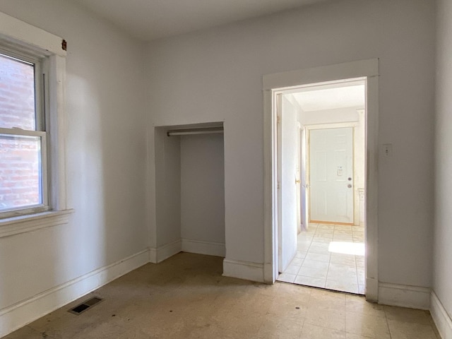 interior space with a closet