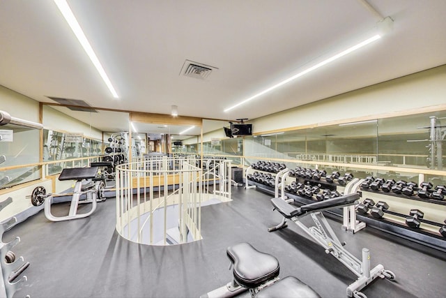 workout area featuring visible vents