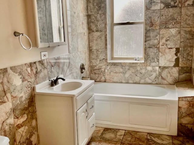6945 S Dorchester Ave Unit 2S, Chicago, IL 60637 - bathroom with tile walls, a bath, and vanity