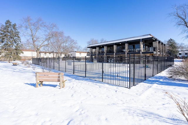 view of snow covered pool