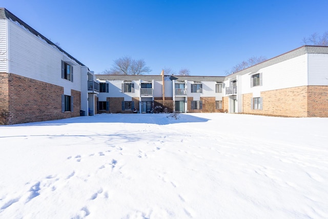 view of snow covered property