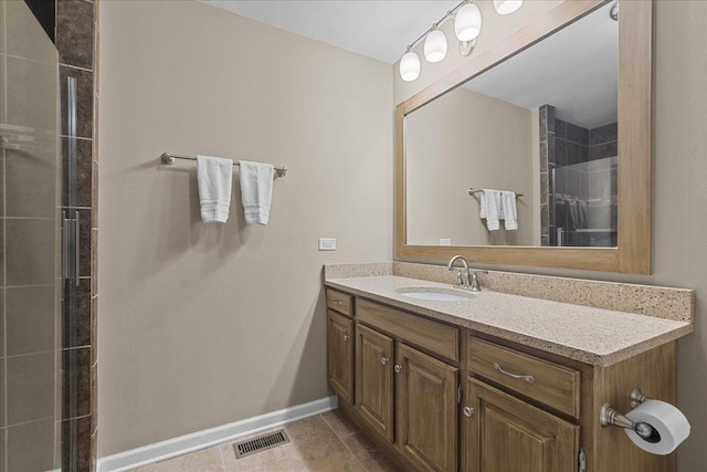 bathroom featuring vanity and tile patterned flooring