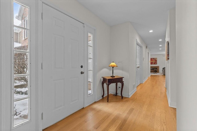 entrance foyer with light wood-type flooring