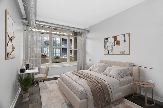 bedroom featuring hardwood / wood-style flooring