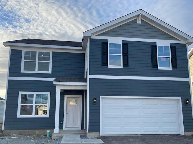 view of front of house with a garage