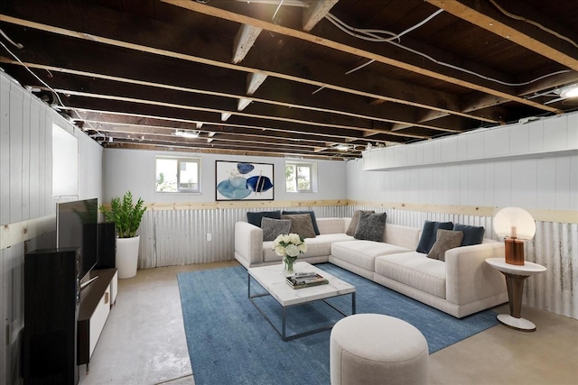 living room featuring wooden walls