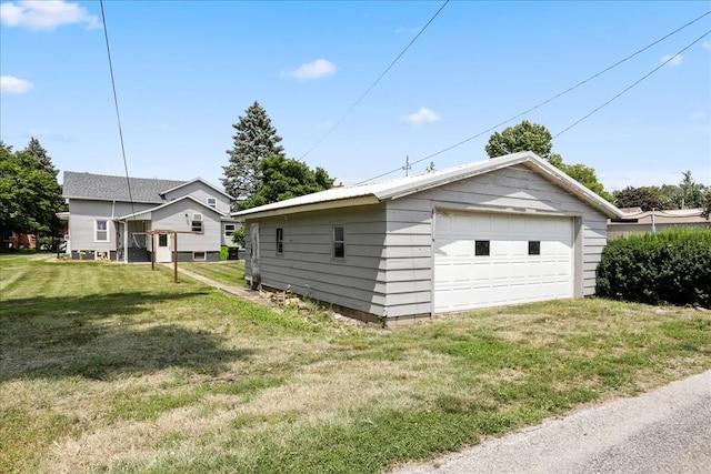 garage with a lawn